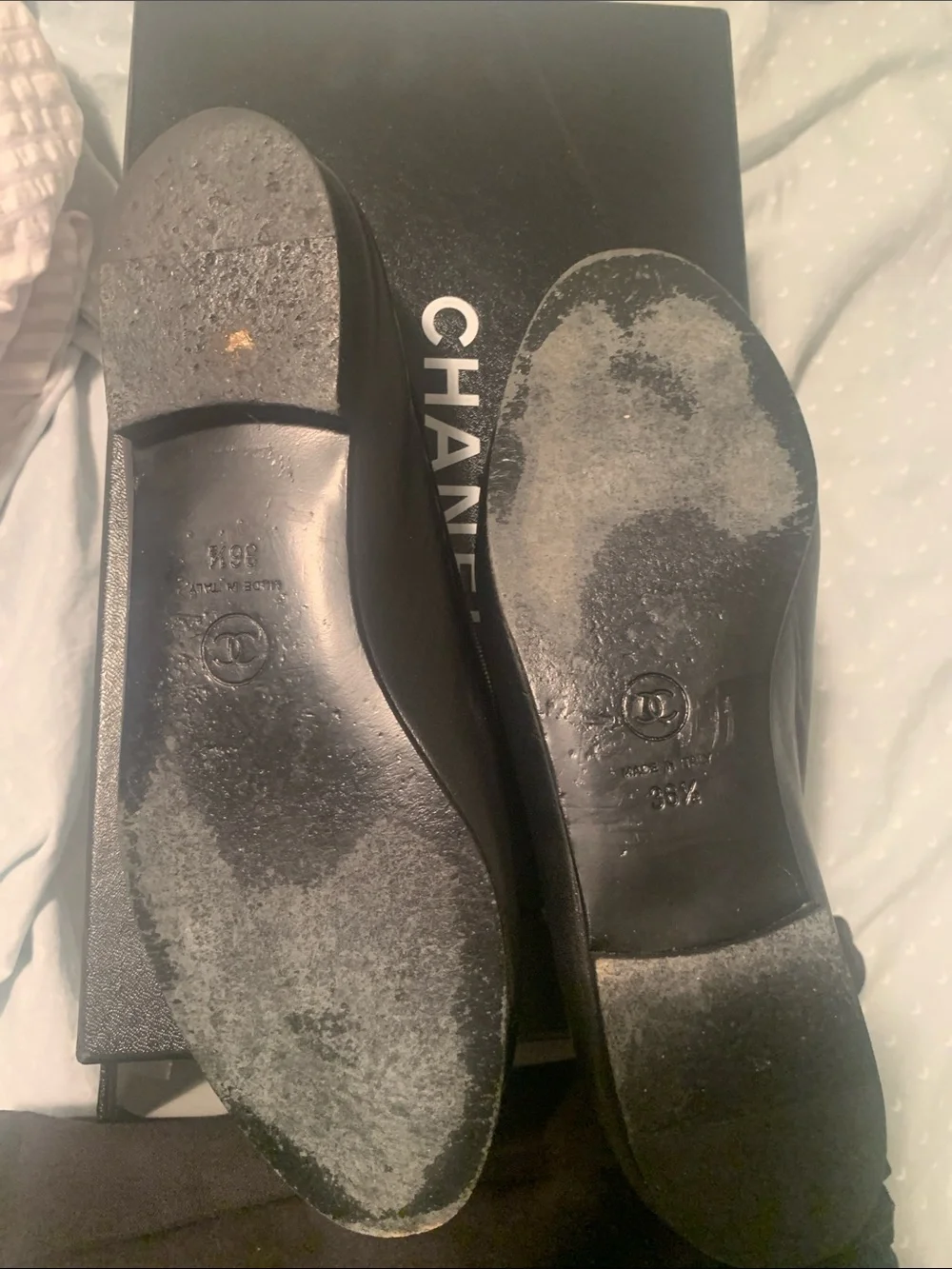 CHANEL Black Leather Cap-Toe CC Ballet Flats